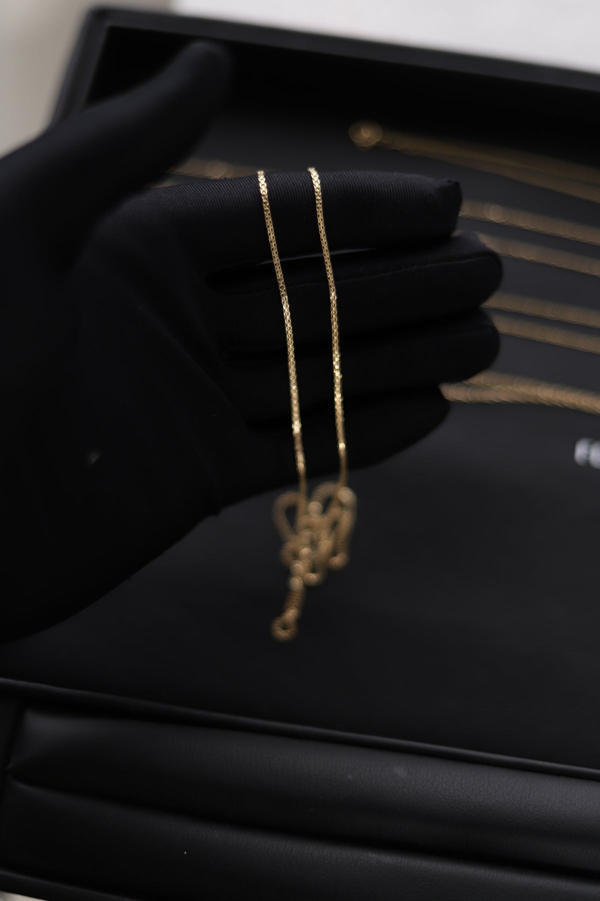 Cadena Horizonte Dorado tejido chino  en oro 18kt