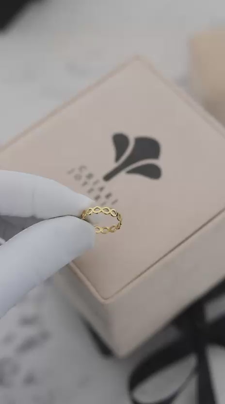 Anillo infinitos entrelazos oro 18 kt